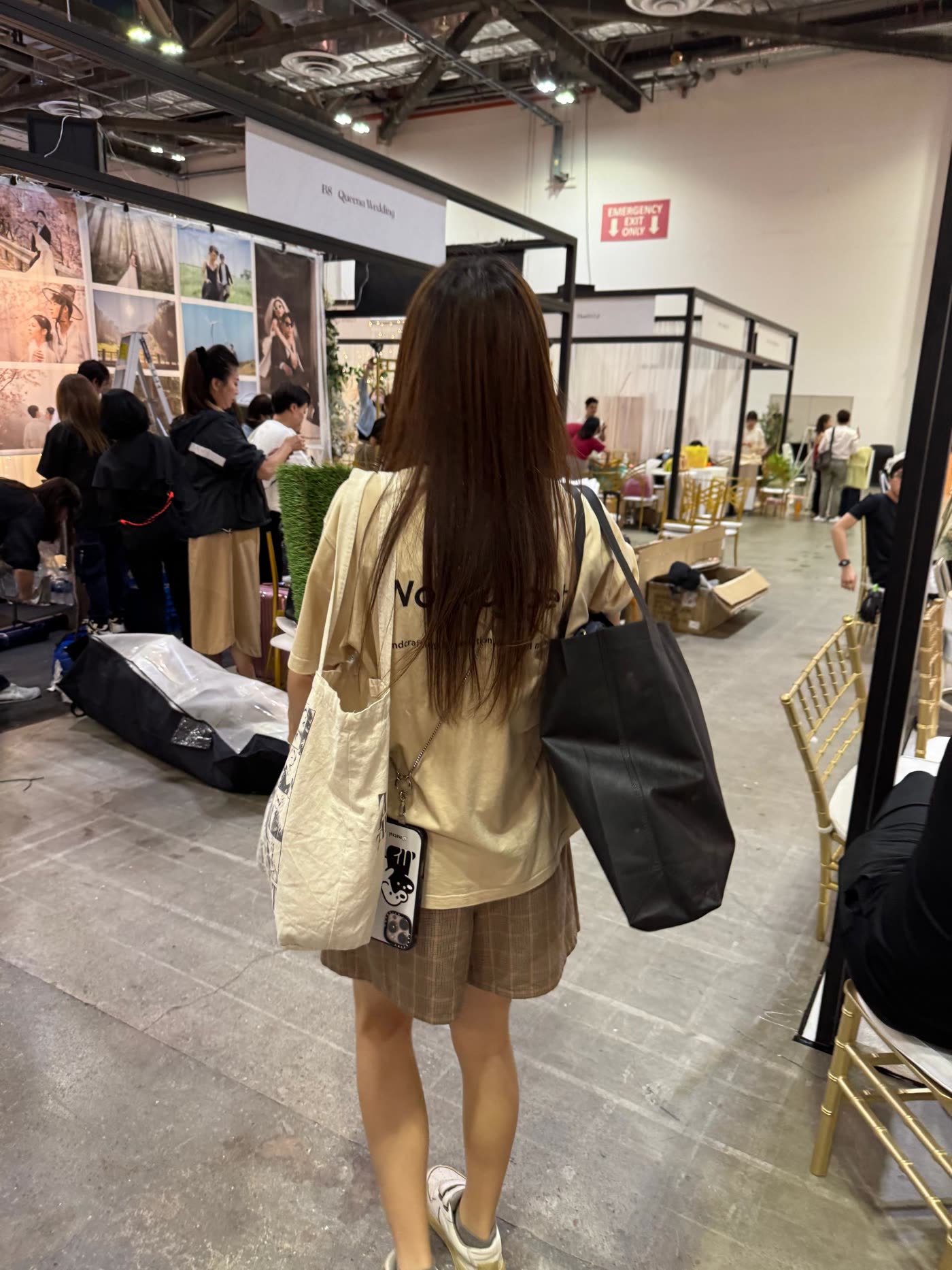 A visitor walking the aisles of the Blissful One-Stop Wedding Show